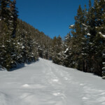 This is Hwy 34. Normally this is the road up and over the mountain but in the winter they close it since it's impossible to keep it clear. Hiking is allowed with a permit.