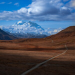 View of Mt. McKinley from Stony Hill Overlook in Denali National Park. The road is the McKinley/Denali Park Road which is the only access to the park.