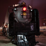 From the UP Facebook page posted on August 14, 2012. They used this photo to go along with the description. Photo must have been lifted from my Smugmug site.The red light in question a lot; On UP #844 was used on high-speed passenger engines and were for use while standing in stations so oncoming passenger trains would not enter the particular track they were occupying. The lights were designed by the Mars Headlight Company and were basically designed for flagging both in station tracks, as mentioned above, and on the mainline. If a train went into emergency the red light, which was a working wigwag by the way, would automatically trip and start working without the engineer having to manually turn it on. Some have never seen the "mars" light on the 844 on...so here.The mars light can be taken as a "final stop NOW"..or maybe the track it's on doesn't have a working signal or it's on an older track (since we do excursions on older lines and routes sometimes)...but most importantly, don't forget. The engine is from the early 1940's..therefore technology was different and so were rules. We simply are keeping the original engine and making sure the public see's what it was like.