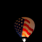 Before the rest of the ballons take off for the Mass Ascension a few balloonists volunteer to check out the winds aloft.