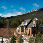 The Chapel on the Rock (officially, Saint Catherine of Siena's Chapel) is a popular tourist landmark in Allenspark, Colorado, visited by thousands every year. The chapel is located on the grounds of the Saint Malo Retreat Center, the retreat center for the Roman Catholic Archdiocese of Denver, near Mount Meeker. In 1999, Boulder County designated the chapel as a historic site.Pope John Paul II prayed at the chapel during his visit to Denver for World Youth Day in 1993. Afterwards, the chapel received his personal blessing. The Pope later hiked in the surrounding woods and spent some time at the Saint Malo Retreat Center.The Saint Malo Retreat Center was destroyed by fire in November 2011, but the chapel was not damaged.